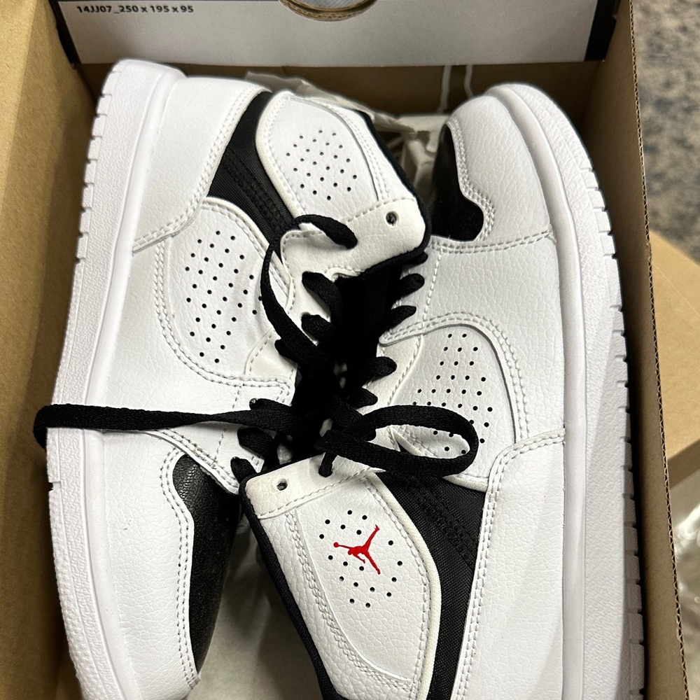 White and Black Sneakers with Red Logo